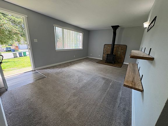 Cozy woodburning stove can help offset heating costs in the winter!