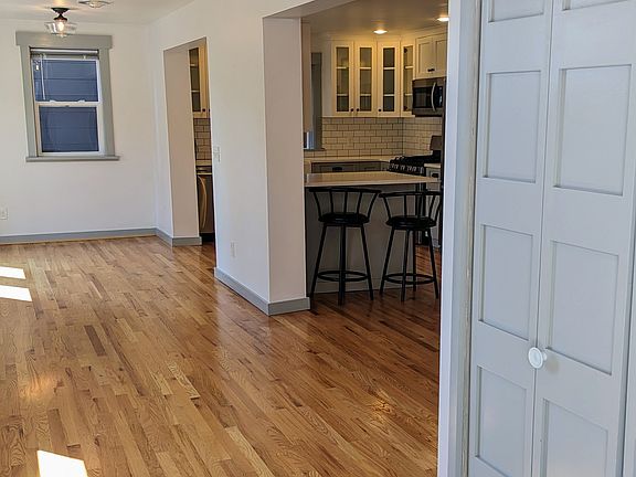 View from front door, entry closet, dining area, kitchen