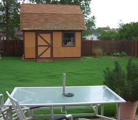 Rear with shed and fire pit