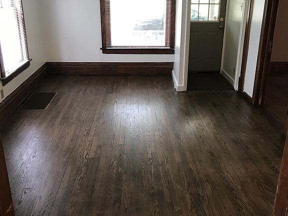 Living room and front entrance.