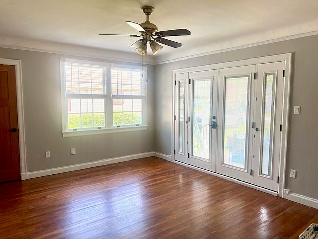 Double front door with screened, side windows.