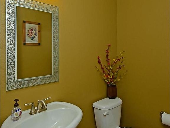 Formal Dining with Archway, Double Sided Gas Fireplace,Art Niche