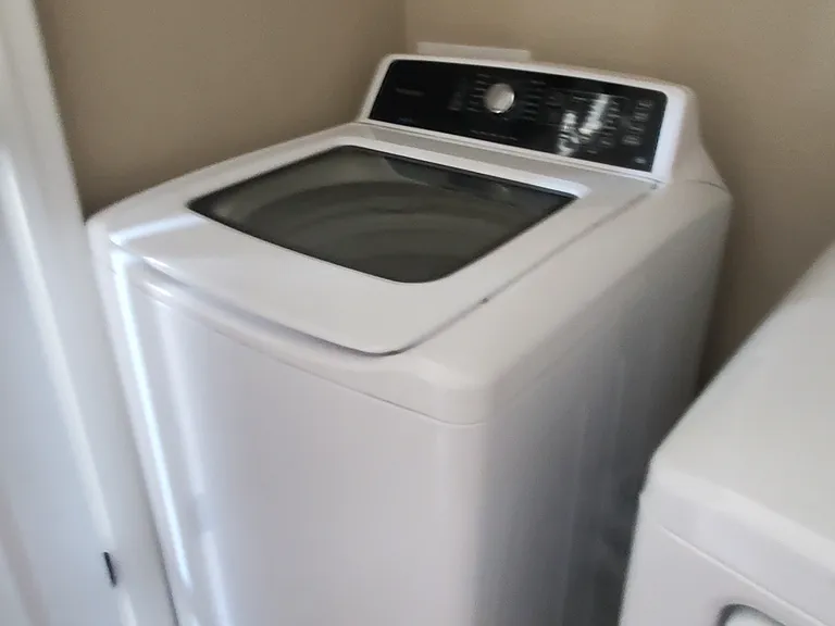 washer and dryer on upstairs hallway