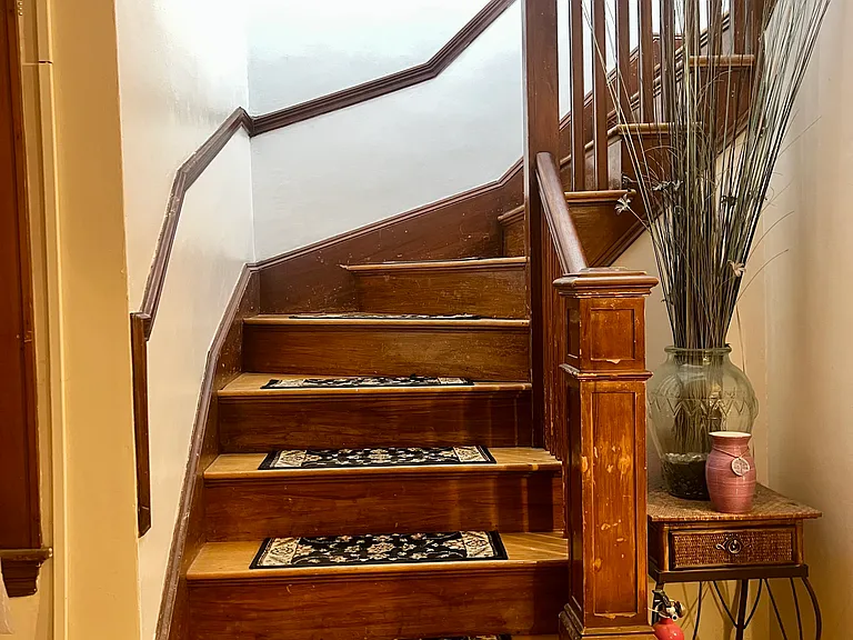 Stairs to second floor bedrooms.