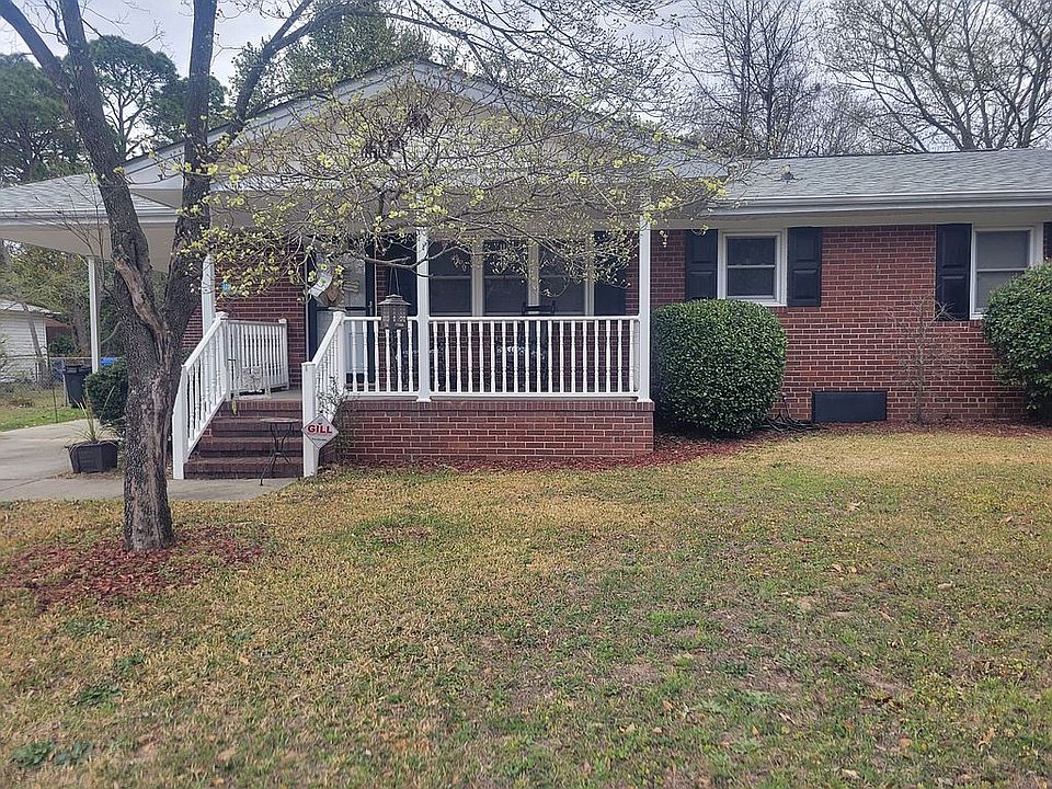 Brick home with vinyl sidingreplacementwindowsgaspack