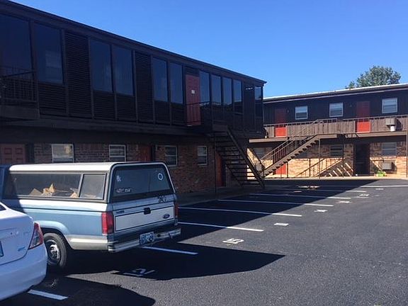 middle building, assigned parking