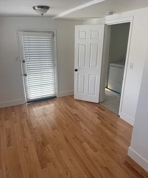 Bedroom 3 off the laundry room and half bath