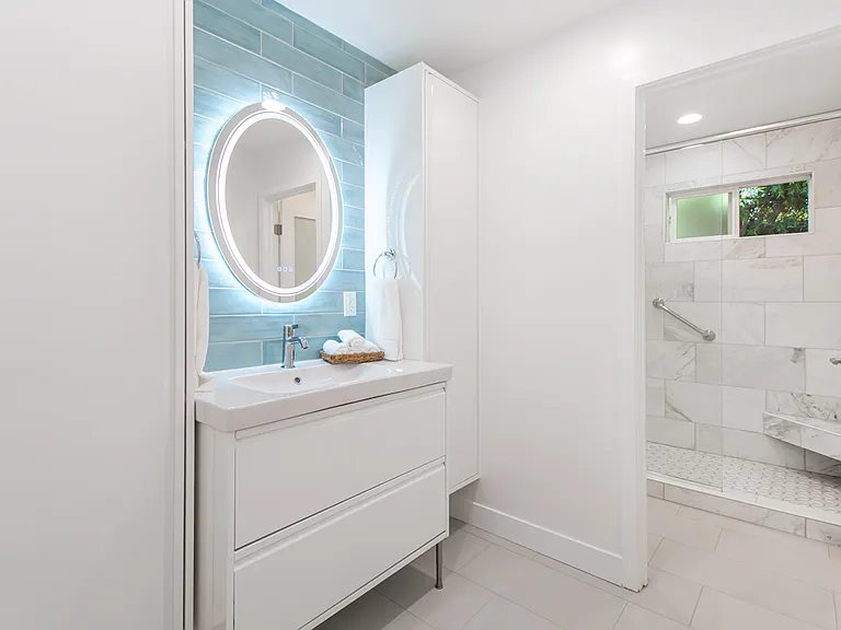 Plenty of storage, picture shows closed tall cabinets.
