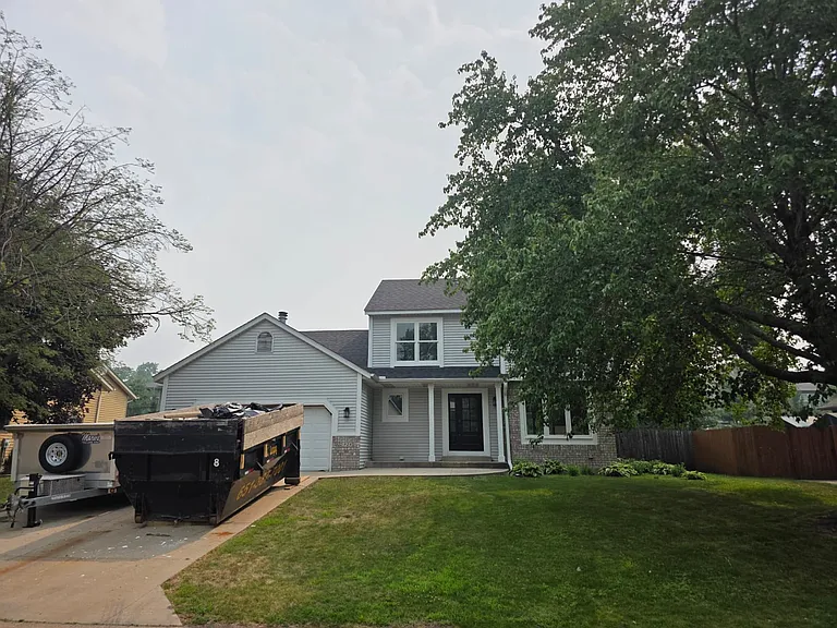 Front of house, finishing up completed, top to bottom, premium finishing remodel.