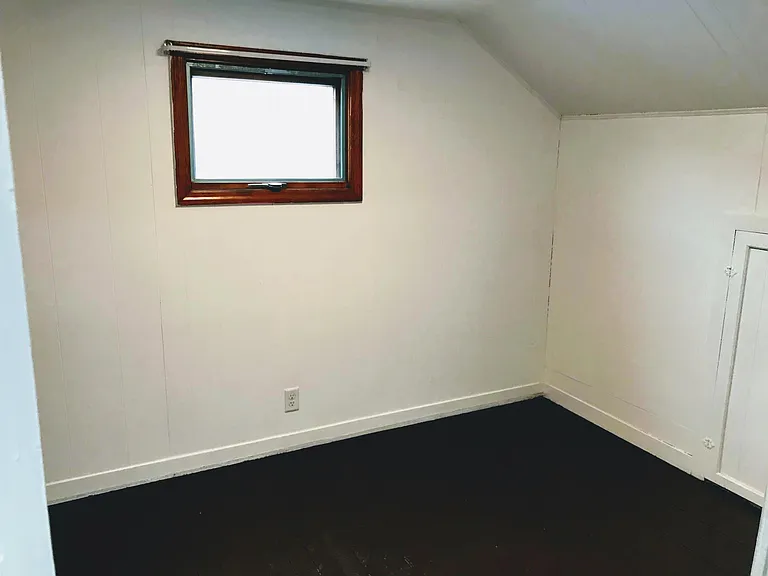 Bedroom #1 with freshly painted hardwood floor
