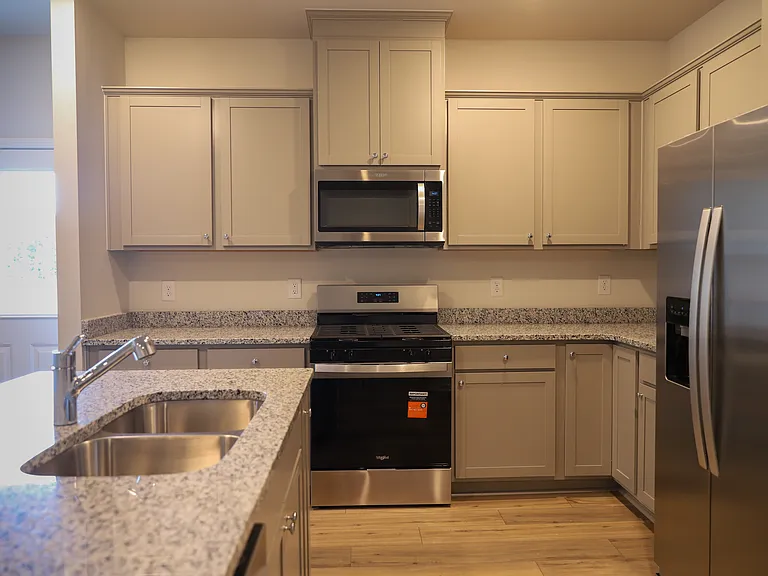 Modern Kitchen with dual bowl sink in the island