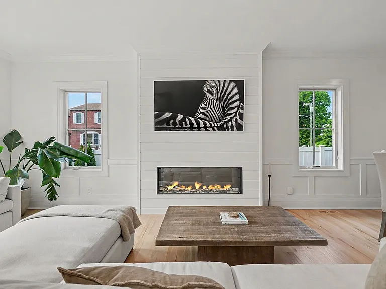 A modern gas fireplace creating a striking focal point.