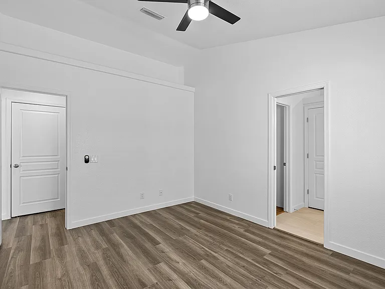 Master bedroom and bathroom. 
Outside the door are the coat closet and garage.