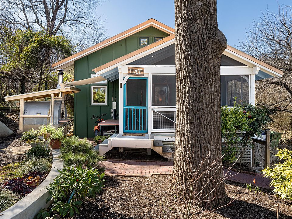 A chef's delight home with hand-built bread/pizza oven and raised beds in the back of the home.