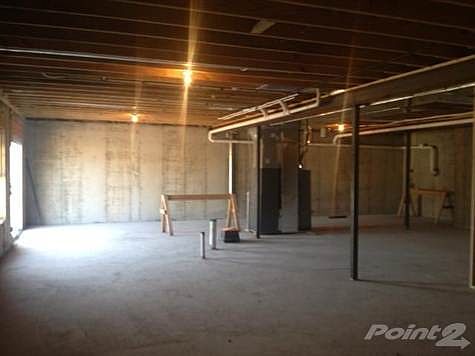 very large unfinished w/out basement with 9ft ceilings