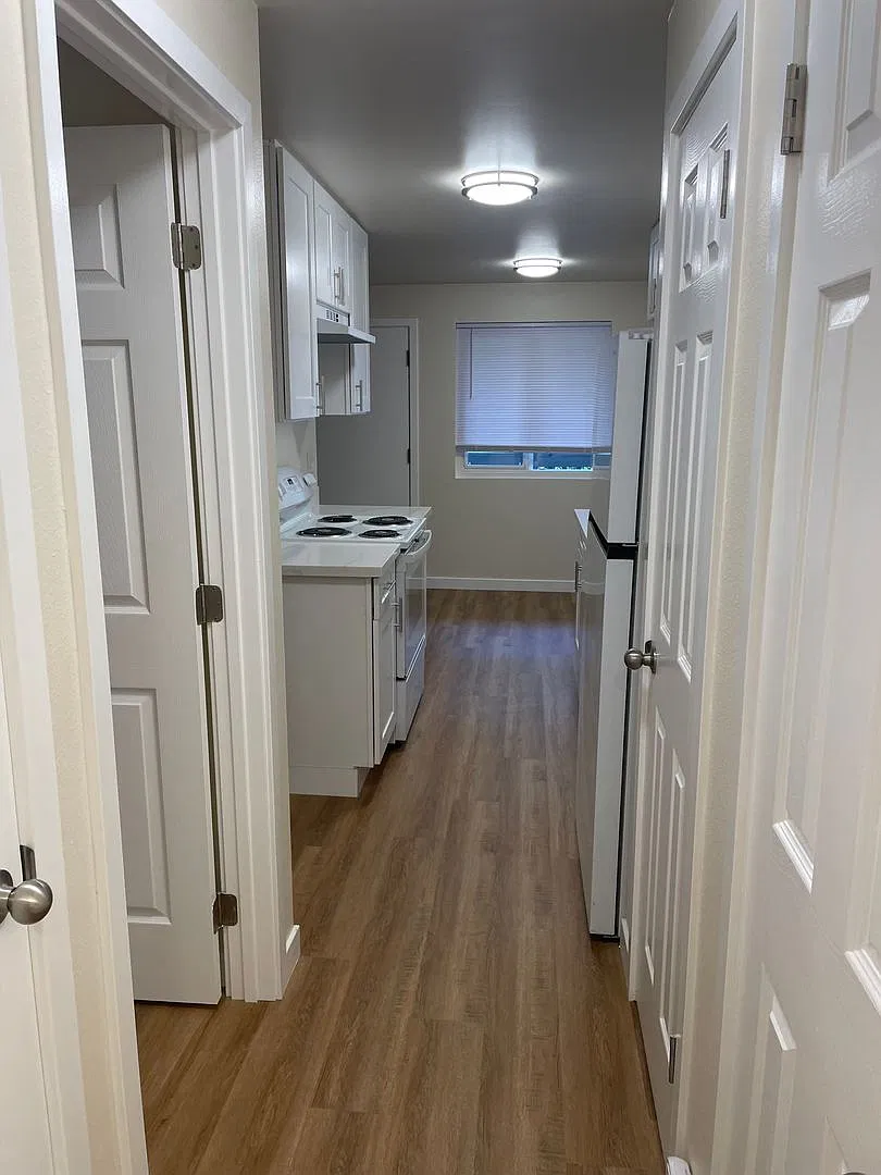 Village Apartments — Photo 3