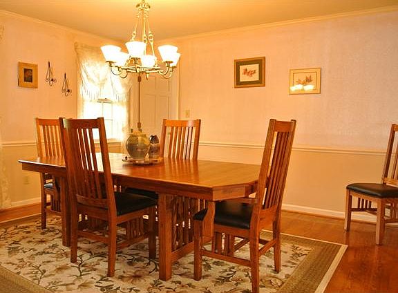 Dining Room with chair rail and crown molding