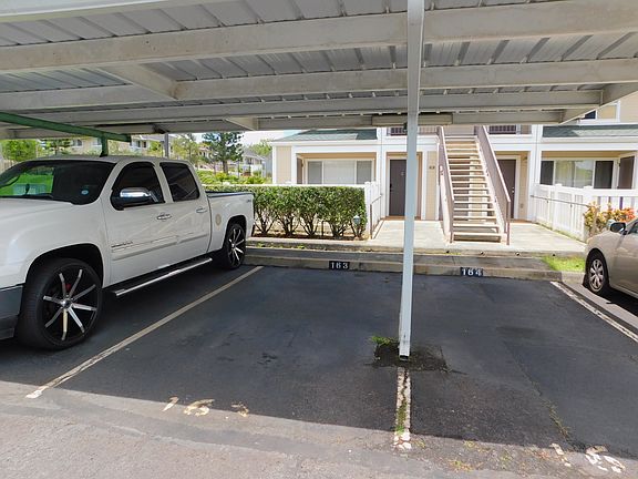 One assigned covered parking stall