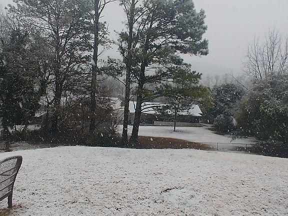 SNOWY VIEW FROM BACK PORCH