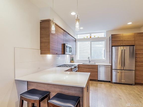 What's not to love about the quartz countertops, laminate hardwood floors and stainless steel appliances?  