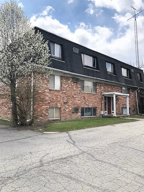 Building Photo - 720 W Alexis Rd #7