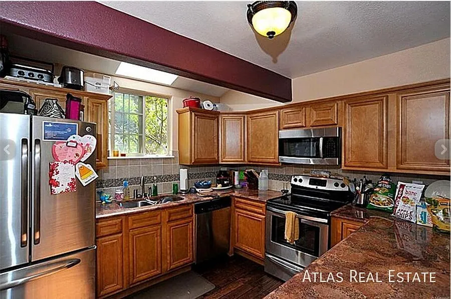 Building Photo - 10694 Asbury Ave #107