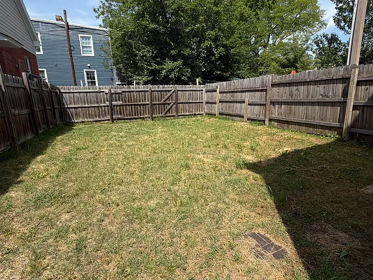 Fully fenced in backyard with off street parking
