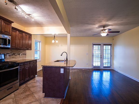Entry view to kitchen + living room