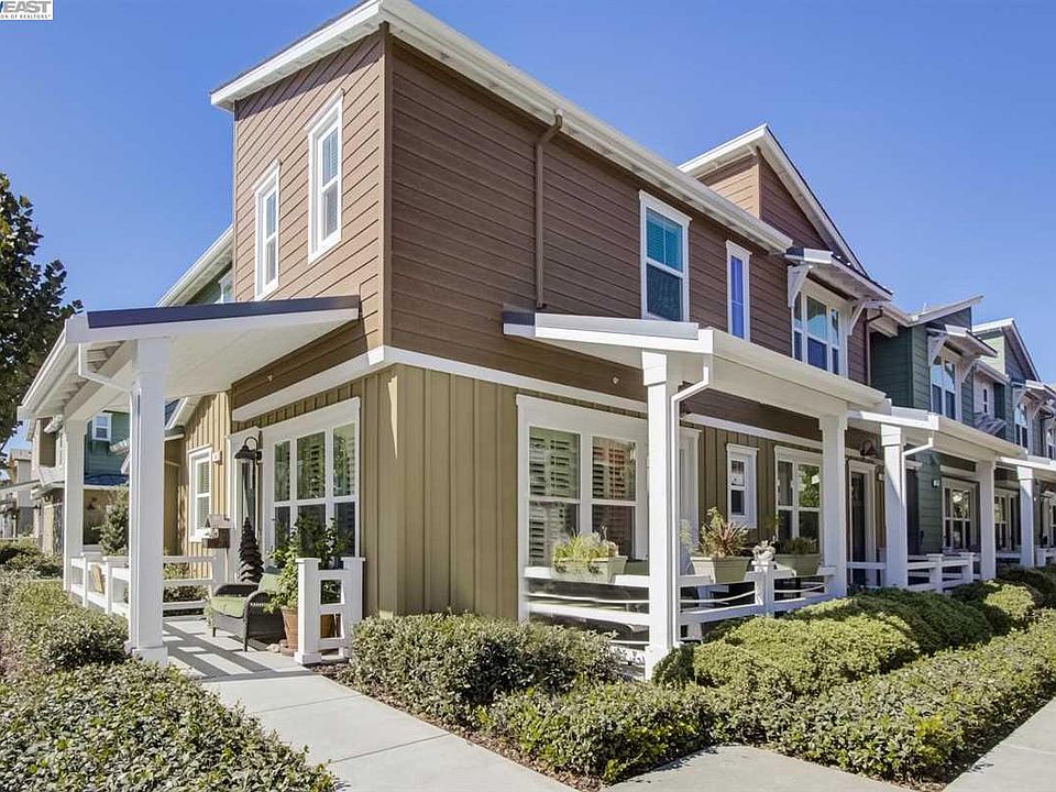 end-unit home featuring two patios