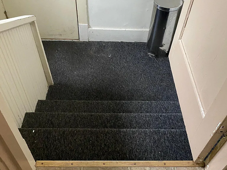 Back entry off kitchen and stairs that lead down to badement
