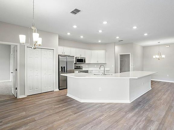 Ample dining space is available thanks to the island, sunny cafe, and formal dining room - Willow I