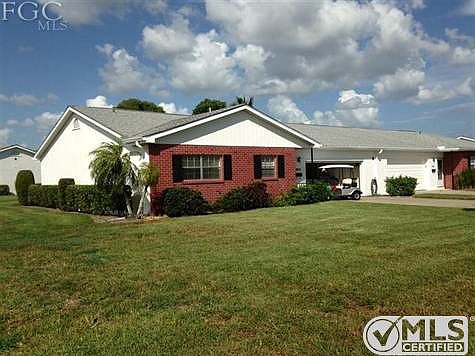 Front of home, with 2 car garage