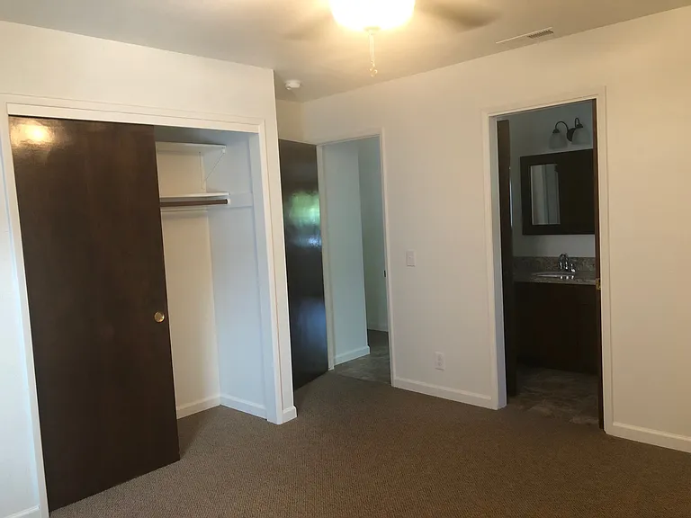 Second Bedroom from window, pocket door into second bathroom