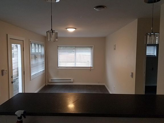 Family room overlooking bar sitting area
