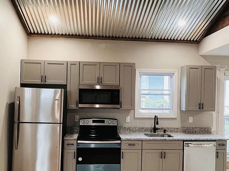 Steel ceiling / L:ED recessed lighting - 
Brand New Kitchen w Appliances and Granite.