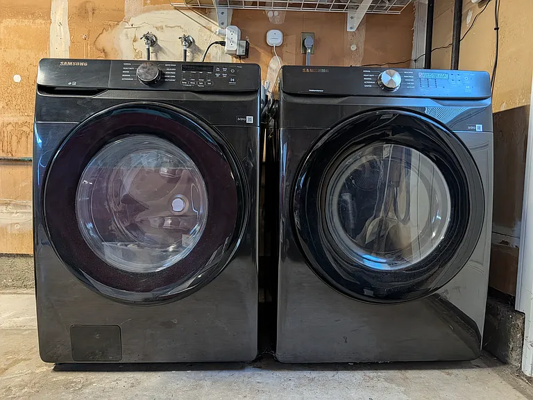 Brand new Samsung washer and dryer in the attached 2 car garage.