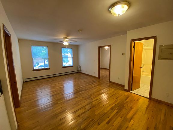 Spacious open kitchen-dining-living room.
