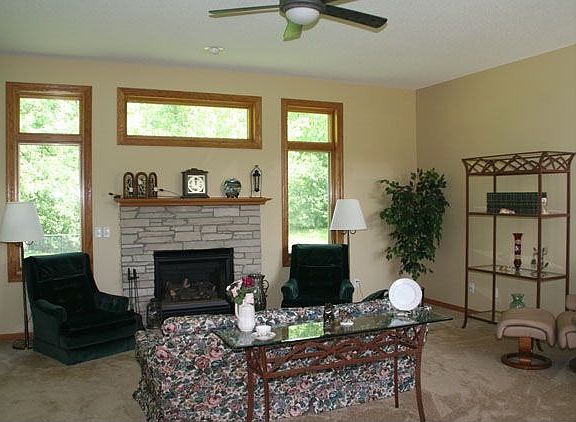 livingroom with brick fireplace