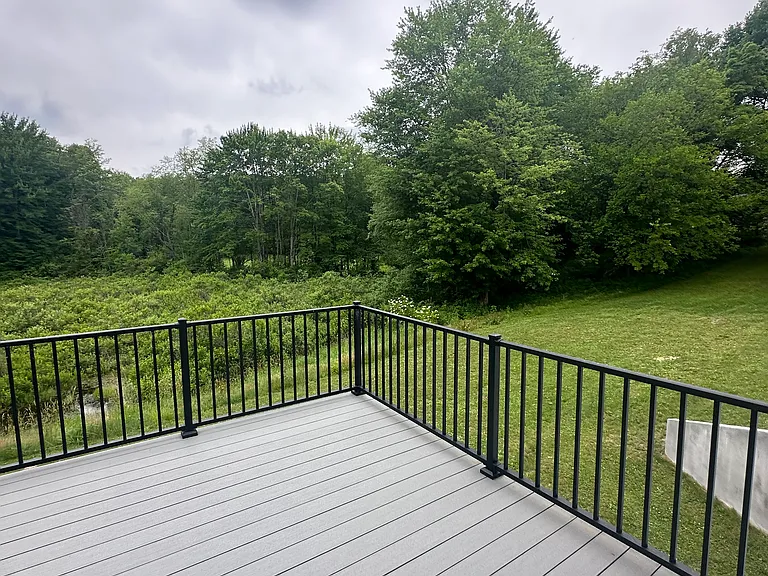 Composite deck with backyard view