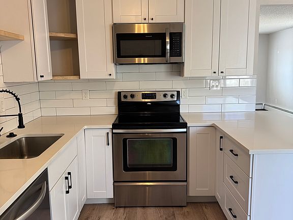 5th image of 3068 S Delaware St