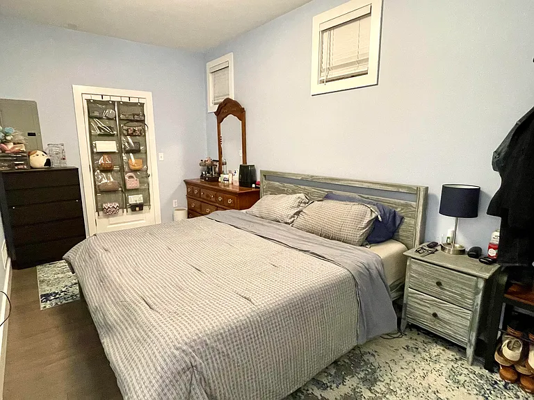 Master bedroom with king-sized bed (night time)