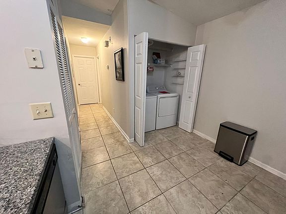 Inside laundry with washer and dryer
