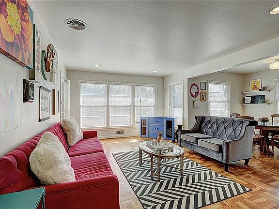 Beautiful light filled open living and dining rooms! Refinished hardwood parquet floors! Recessed LED lighting!