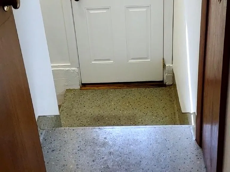 stairs to the backdoor and the basement