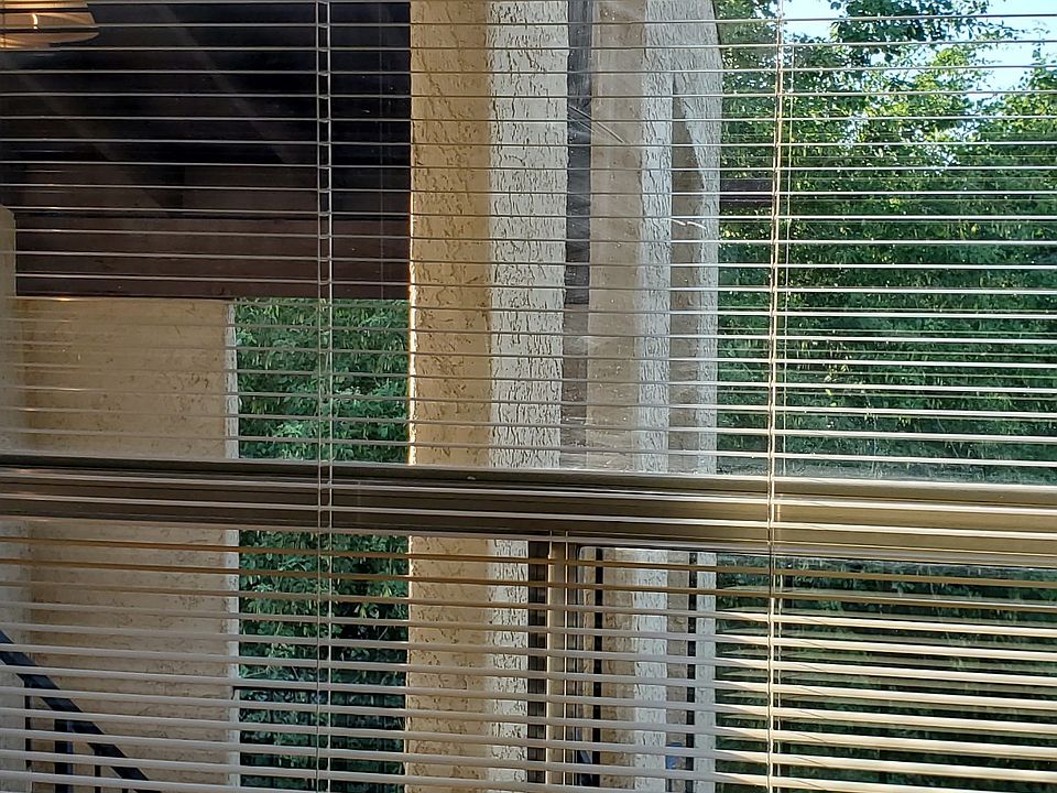 Open the blind. There is also a view of the swimming pool below.