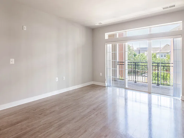 Living Room with Balcony and Hard Surface Flooring