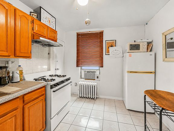 3rd image of 124 Mott St APT 36