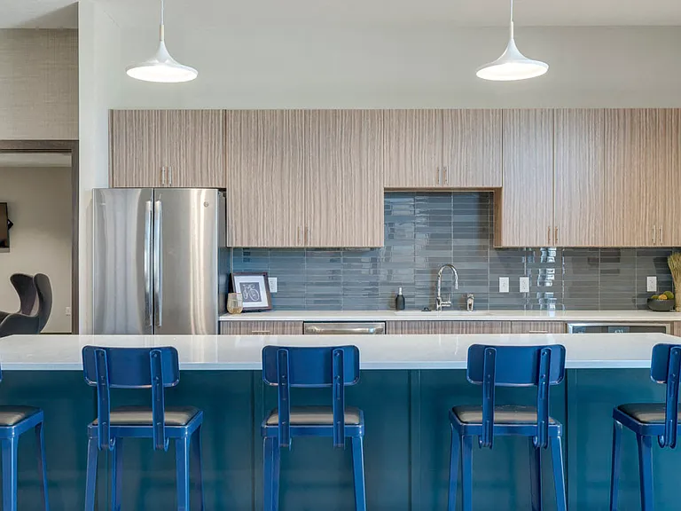 Share your favorite dishes in the sleek community kitchen.