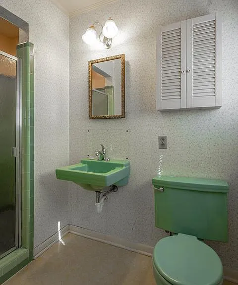 Master bath with large, original tiled shower.