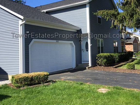 Covered entrance with storm door